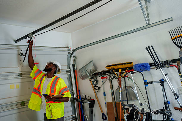 Professional Garage Door Panel Replacement technician working in Woodmere, LA
